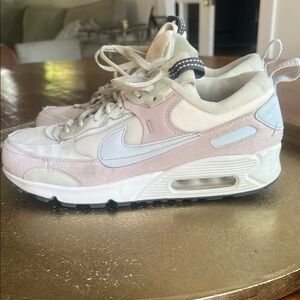 Nike Pink and White Sneakers with Air Max Cushioning